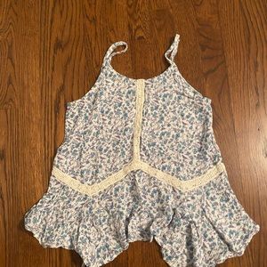 Super cute girls flowy flower tank top.